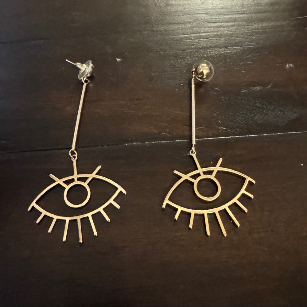 Eye earrings.